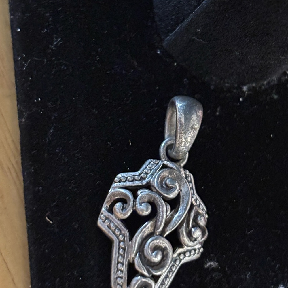 Elegant Silver Swirl Pendant